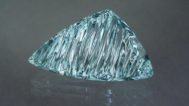 10.37-Carat Aquamarine. Aquamarine is a great medium for artistic designer cuts like this 10.37-carat beauty. - Lydia Dyer, gem courtesy John Dyer & Co.