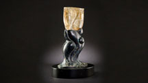 This rutilated smoky quartz sculpture – virtually free of feathers or flaws with very even dispersion of rutile needles – is from Rio Grande do Sul, Brazil. 