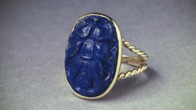Lapis Lazuli. An attractive design has been carved into this ring’s lapis cabochon.