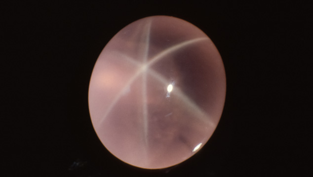 This fine-quality star rose quartz has attractive color and transparency and a well-defined star. – Robert Weldon. This star rose quartz is considered fine quality because of its depth of color, degree of transparency, and sharply defined star. – Robert Weldon