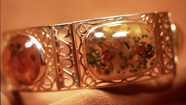 Amber Bracelet. The red and green dyes in this bracelet’s amber pieces can fade over time.
