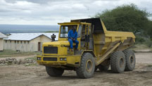 In 1990, the Tanzanian government divided the Merelani Hills tanzanite mining area into four zones or blocks (named A, B, C, and D). In 2000, the company Afgem acquired the mining rights to Block C, which was taken over in 2004 by the TanzaniteOne Group.