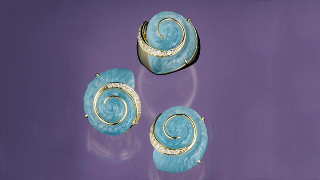Aquamarine Designer Jewelry. Aquamarine that’s too included for faceting is often carved and set into designer jewelry. - © GIA and Tino Hammid