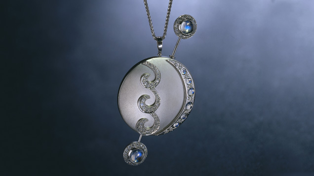 Moonstone Pendant. Top-quality moonstones accent this beautiful platinum and diamond pendant. Moonstone has fascinated designers and gem connoisseurs for centuries. - Courtesy David Humphrey