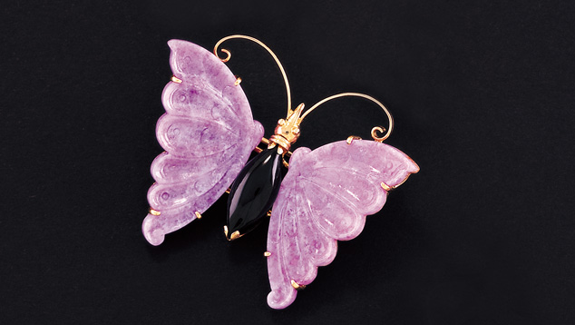 Butterfly Pin. This butterfly pin has wings carved from fine lavender jadeite. The butterfly symbolizes long life. - Courtesy Mason-Kay Fine Jade Jewelry