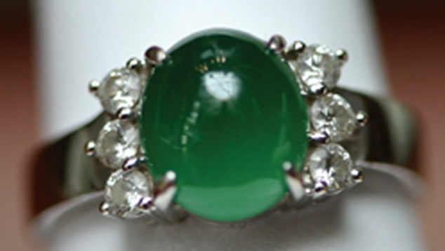 Semitransparent Jade. Some jadeite is transparent enough to allow the observer to see into the stone, revealing the gem’s depth of color and giving it higher value. - Gift of Sophie Leu