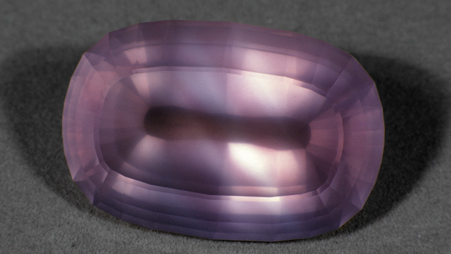 Deep pink shades are very popular for rose quartz, but they’re rare in small sizes. This gem displays noticeable color zoning.. It’s not uncommon to see some quartz varieties with color zoning. This rose quartz exhibits rich purple-pink areas of color.