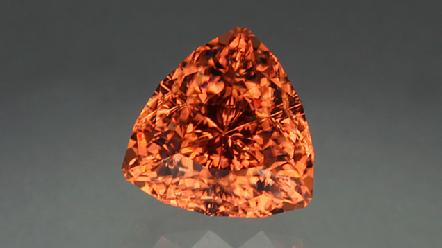 12.84-carat Triangular-cut Zircon. This 12.84-carat triangular-cut zircon displays an attractive orange hue. - John Dyer, Zircon Super Trillion courtesy of John Dyer & Co.