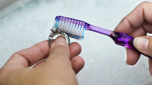 Kunzite. A safe way to clean kunzite jewelry is to use lukewarm water with mild soap and a toothbrush. - Eric Welch