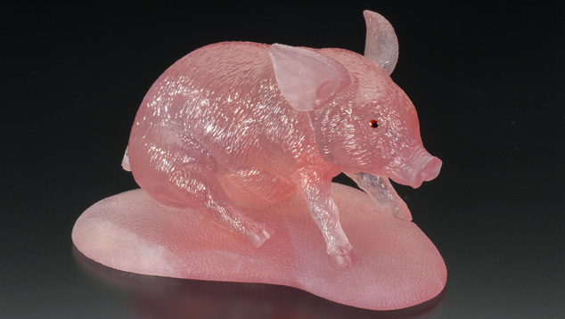 This adorable piglet was carved by Gerd Dreher from rose quartz mined in Madagascar. - Robert Weldon. This adorable piglet was carved by Gerd Dreher from rose quartz mined in Madagascar. – Robert Weldon