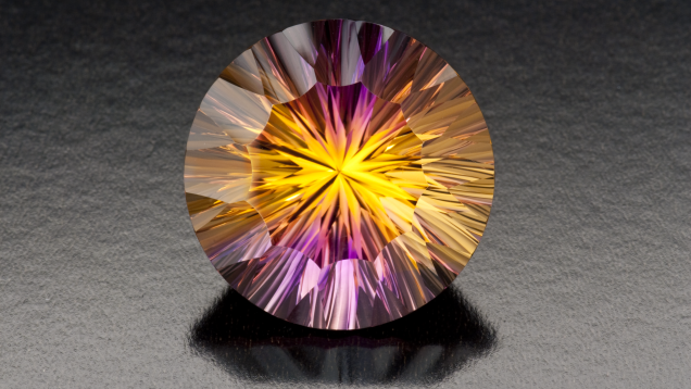 紫色和金色紫黄晶. 这颗重 44.00 克拉的紫黄晶的特点在于其下凹刻面，能够将紫色和金色巧妙融合，产生美艳的效果。 Minerales y Metales del Oriente. 友情提供