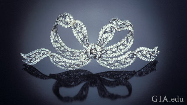 A bow brooch with long ribbon tendrils. A bow brooch with long ribbon tendrils.