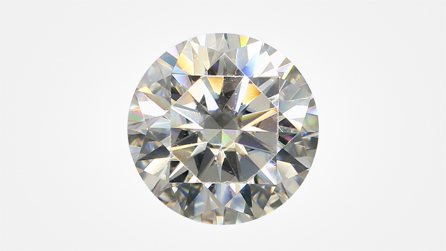 Synthetic moissanite with a fraudulent inscription.