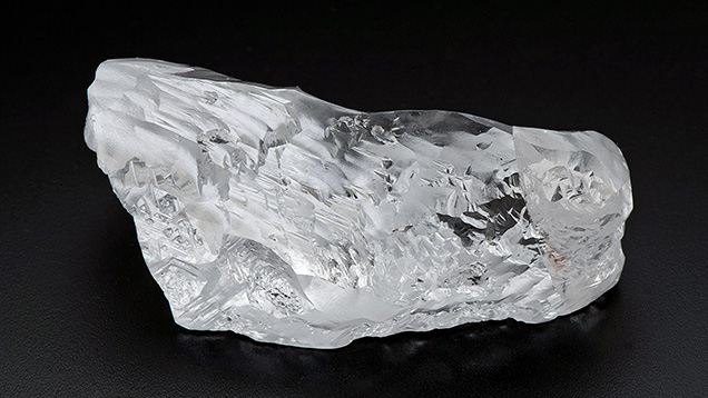 404.2 ct type IIa rough diamond from the Lulo mine in Angola used to fashion a 163.4 ct emerald-cut diamond. 404.2 ct type IIa rough diamond from the Lulo mine in Angola used to fashion a 163.4 ct emerald-cut diamond.