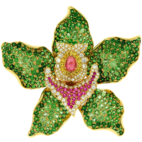 Maia’s Gift brooch by Paula Crevoshay.. Figure 2. Maia’s Gift brooch. Yellow gold, tsavorite garnet, pink and yellow sapphire, and diamond. Photo courtesy of Paula Crevoshay.