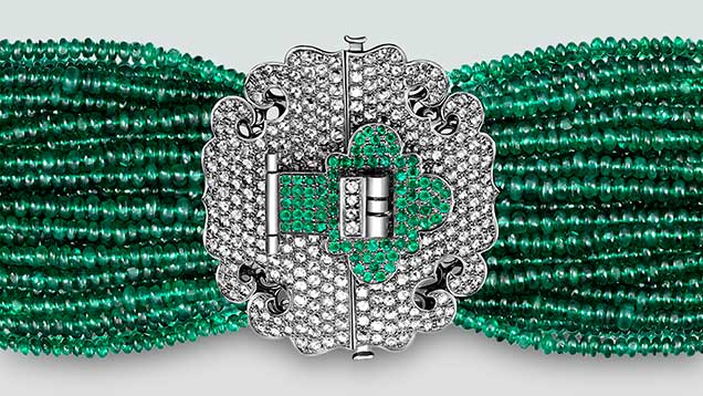 This diamond and emerald bracelet is from Dickson Yewn’s “Lock of Good Wishes” collection. The four corners of the lock panel are decorated with simplified bat patterns, which symbolize good luck and happiness in Chinese culture. The clasp is a realistic recreation of an ordinary gate lock from ancient China. The concept is typically used in baby jewelry to make the wearer feel blessed throughout life, and Yewn has successfully applied it to adult pieces. Photo courtesy of Dickson Yewn This diamond and emerald bracelet is from Dickson Yewn’s “Lock of Good Wishes” collection. The four corners of the lock panel are decorated with simplified bat patterns, which symbolize good luck and happiness in Chinese culture. The clasp is a realistic recreation of an ordinary gate lock from ancient China. The concept is typically used in baby jewelry to make the wearer feel blessed throughout life, and Yewn has successfully applied it to adult pieces. Photo courtesy of Dickson Yewn