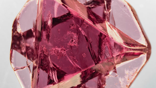 Rare spinel macle. Figure 1. This 12-sided crystal recently obtained in Mogok is a rare spinel macle, hosting fascinating multiphase (liquid + gas) inclusions. The stone is reportedly from the eastern part of the Mogok Valley. Photo by Victoria Raynaud/GIA; field of view 5.7 mm.