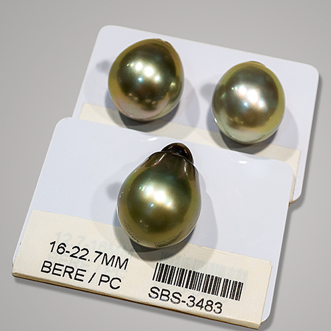 Trio of matching-color Tahitian cultured pearls. Trio of matching-color Tahitian cultured pearls.