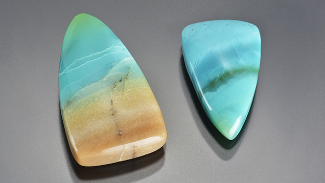 Indonesian opal cabochons, 6.94 and 3.79 ct. Indonesian opal cabochons, 6.94 and 3.79 ct.