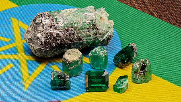 Rough and faceted Ethiopian emeralds Rough and faceted Ethiopian emeralds