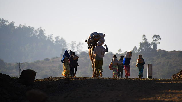 Ethiopian family on the road to the market in Chila Ethiopian family on the road to the market in Chila