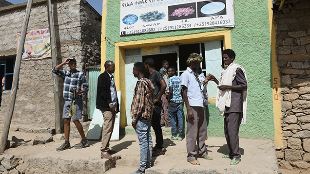 Gem dealers at the market in Chila Gem dealers at the market in Chila