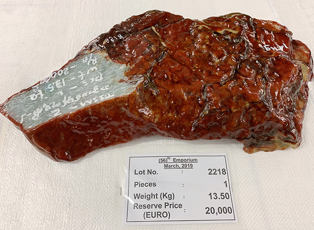 Rough jadeite boulder with a thin reddish brown skin. Rough jadeite boulder with a thin reddish brown skin.
