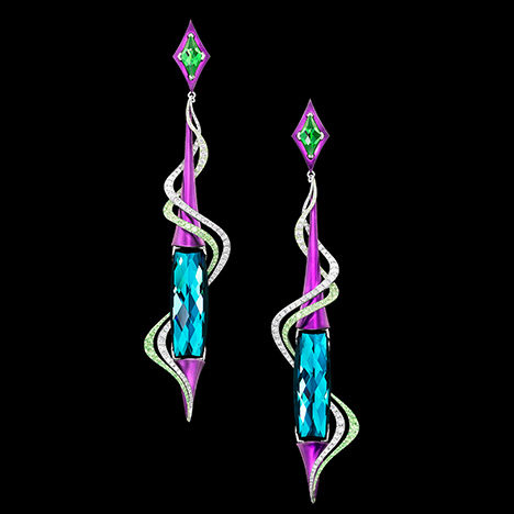 Two indicolite tourmalines cut by Avery are featured in earrings designed by Adam Neeley. Two indicolite tourmalines cut by Avery are featured in earrings designed by Adam Neeley.