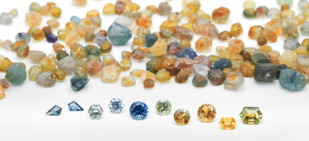 Figure 19. Montana sapphires in a range of shapes and colors. All are heated, and the faceted stones range from about 0.20 ct for the 3 × 5 mm kite shapes on the left to 2.11 ct for the hexagon on the right. Photo by Dillon Sprague; courtesy of Columbia Gem House. Figure 19. Montana sapphires in a range of shapes and colors. All are heated, and the faceted stones range from about 0.20 ct for the 3 × 5 mm kite shapes on the left to 2.11 ct for the hexagon on the right. Photo by Dillon Sprague; courtesy of Columbia Gem House.