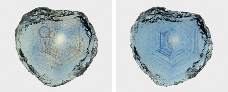 Figure 46. The Rock Creek sapphire in example 3, measuring 9.5 × 9.2 mm, before (left) and after (right) heat treatment shows creation of blue color by heat treatment. The gray circle on the left shows the position of the UV-Vis spectroscopic measurement. Photos by Aaron Palke. Figure 46. The Rock Creek sapphire in example 3, measuring 9.5 × 9.2 mm, before (left) and after (right) heat treatment shows creation of blue color by heat treatment. The gray circle on the left shows the position of the UV-Vis spectroscopic measurement. Photos by Aaron Palke.