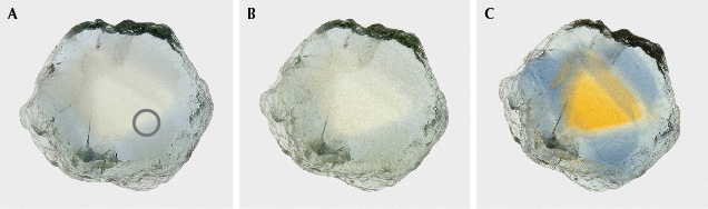 Figure 54. The Dry Cottonwood Creek sapphire in example 5, measuring 7.2 × 6.7 mm: unheated (A), heated to 1200°C in pure O2 (B), and heated to 1700°C in pure O2 (C). The gray circle shows area of analysis. Photos by Aaron Palke. Figure 54. The Dry Cottonwood Creek sapphire in example 5, measuring 7.2 × 6.7 mm: unheated (A), heated to 1200°C in pure O2 (B), and heated to 1700°C in pure O2 (C). The gray circle shows area of analysis. Photos by Aaron Palke.