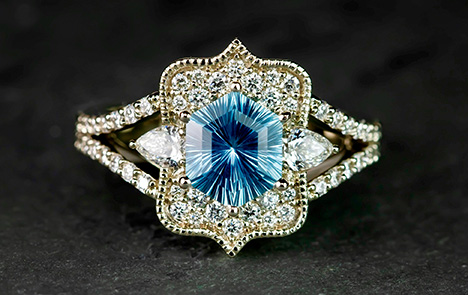 Figure 57. A 2.02 ct unheated Montana sapphire featuring concave faceting. Courtesy of Derek Katzenbach. Figure 57. A 2.02 ct unheated Montana sapphire featuring concave faceting. Courtesy of Derek Katzenbach.