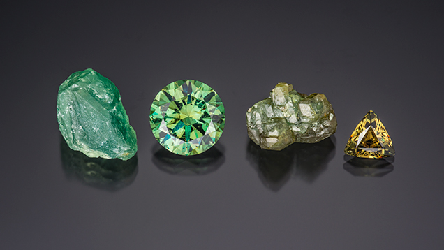 SU15-GNI-fig35_185361-636x358.jpg. A selection of demantoid from Namibia’s Green Dragon mine.
