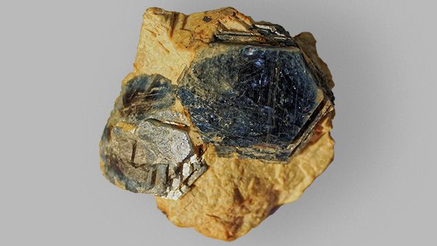 Sapphire in feldspar matrix.