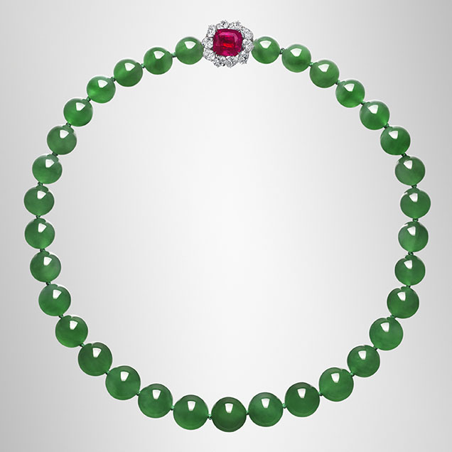 Thirty-three jadeite beads are featured in this necklace sold by Christie’s. Thirty-three jadeite beads are featured in this necklace sold by Christie’s.