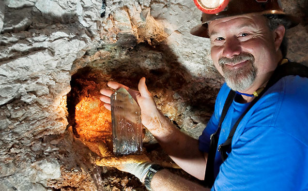 Figure 12. Daron Fisler in 2010 with a spodumene (kunzite) crystal he extracted from the Big Kahuna pocket at the Oceanview mine, Pala District, San Diego County, California. Photo by Mark Mauthner. Figure 12. Daron Fisler in 2010 with a spodumene (kunzite) crystal he extracted from the Big Kahuna pocket at the Oceanview mine, Pala District, San Diego County, California. Photo by Mark Mauthner.