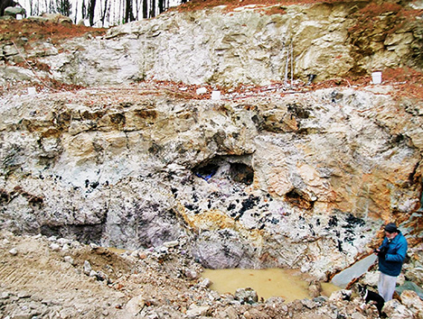 Figure 7. Open pockets along the core zone of the Havey pegmatite near Poland, Androscoggin County, Maine, in June 2017. Courtesy of William (Skip) Simmons. Figure 7. Open pockets along the core zone of the Havey pegmatite near Poland, Androscoggin County, Maine, in June 2017. Courtesy of William (Skip) Simmons.
