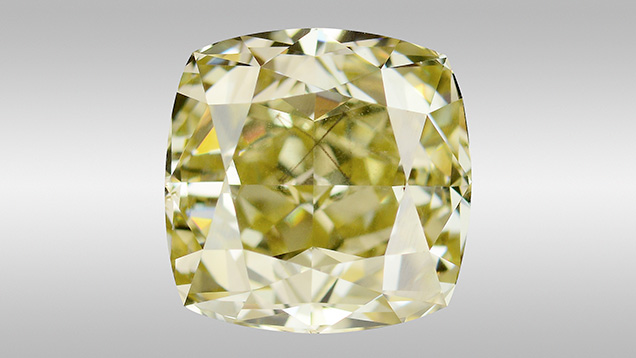 W15-LN-Figure-1_194257-636x358.jpg. Fancy brownish greenish yellow diamond with octahedral-shaped inclusion.