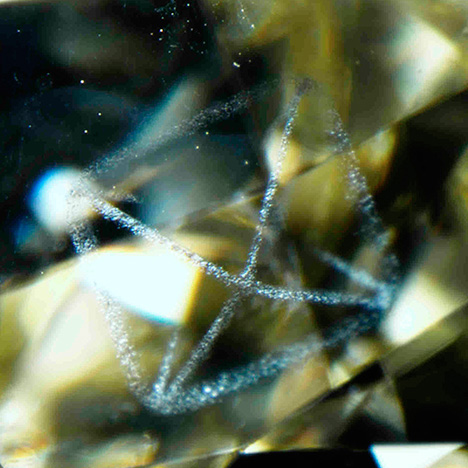 W15-LN-Figure-2_194240-468x468.jpg. Graphite outlines the octahedral crystal faces.