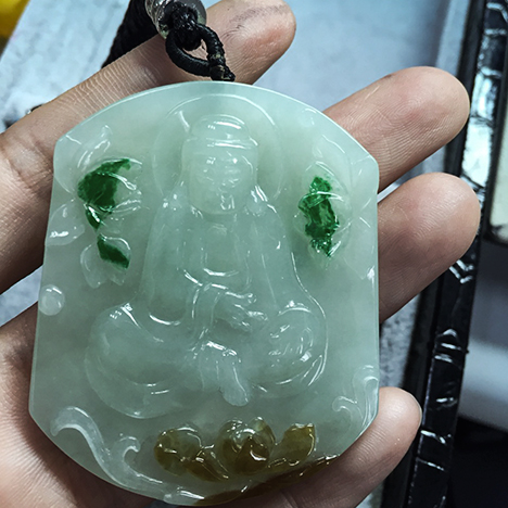 W16-GNI-Figure-17_210787-468x468.jpg. Decorated jadeite pendant.