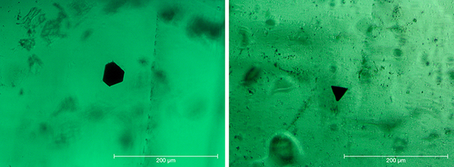 Hexagonal, trigonal opaque particles in Nacken synthetic emerald Hexagonal, trigonal opaque particles in Nacken synthetic emerald