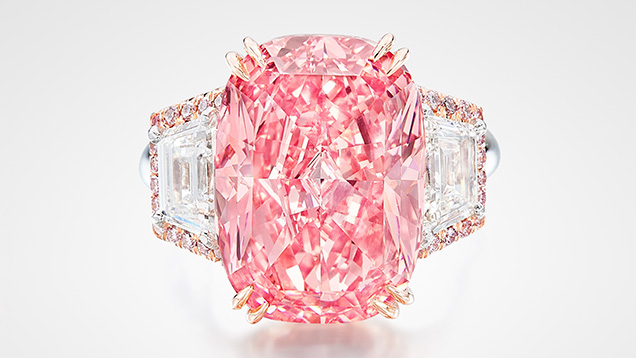 Figure 1. The 11.15 ct Williamson Pink Star is set in an 18K pink and white gold ring, along with 1.41 carats of trapeze-cut diamonds and 0.14 carats of brilliant-cut pink diamonds. Courtesy of Sotheby’s.