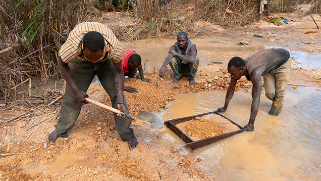 Figure 11. Artisanal miners washing sediments along the Njuga River to recover fancy sapphires and other gem fragments in 2016 near Amani Makoro, a few kilometers from Songea in southern Tanzania. Photo by Wim Vertriest.