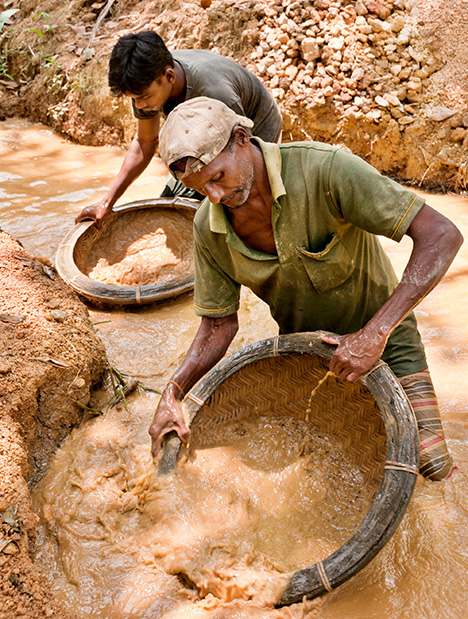 Figure 9. Washing sediments to recover fragments of gems in 2011 near Ratnapura, Sri Lanka. Photo by Vincent Pardieu.