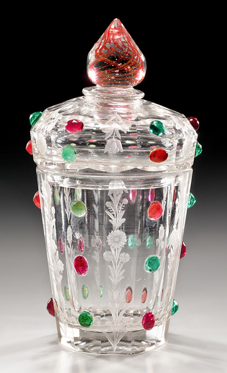 Figure 10. Lidded goblet from the collection of the Passau Glass Museum, embellished with red and green imitation stones made of lead glass. Inventory no. Hö 71145, height 8.5 cm. Photo courtesy of P. Höltl, Passau Glass Museum. Figure 10. Lidded goblet from the collection of the Passau Glass Museum, embellished with red and green imitation stones made of lead glass. Inventory no. Hö 71145, height 8.5 cm. Photo courtesy of P. Höltl, Passau Glass Museum.