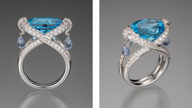 This blue topaz, briolette sapphire, and diamond ring looks good in all directions. The human eye likes symmetry, so the This blue topaz, briolette sapphire, and diamond ring looks good in all directions. The human eye likes symmetry, so the
